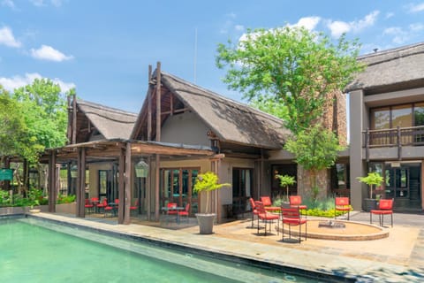 Property building, Patio, Pool view, Swimming pool, Swimming pool