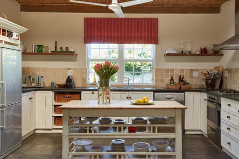 Kitchen or kitchenette, dishwasher, oven, stove