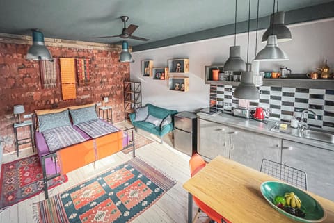 Bed, Coffee/tea facilities, View (from property/room), Kitchen or kitchenette, Living room, Photo of the whole room, Seating area, Dining area, Bedroom