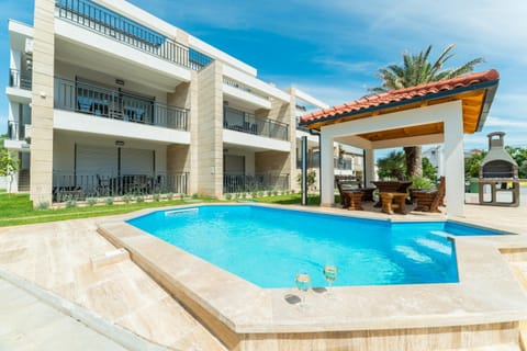 Property building, Patio, Day, Pool view, Swimming pool