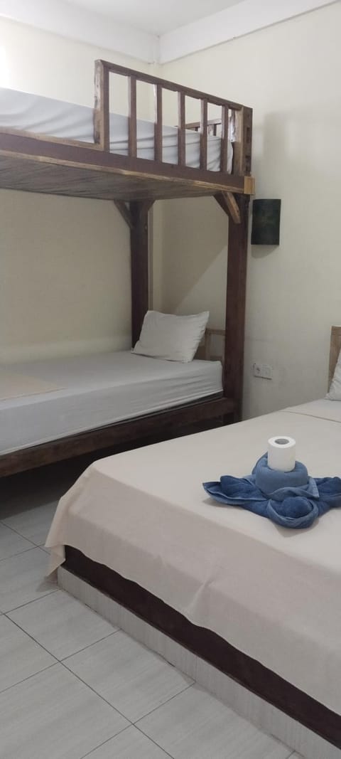 Amed Stop Inn Homestay, Rooftop Restaurant and Bar Bed and Breakfast in Abang