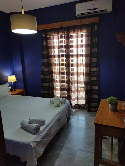 Bed, Photo of the whole room, Bedroom, towels, air conditioner