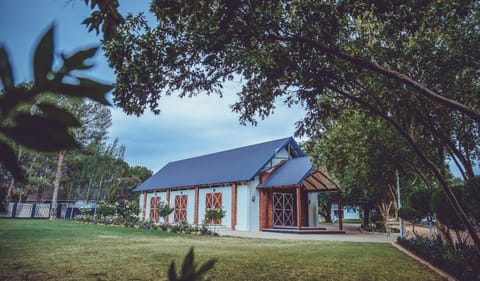 Property building, Day, Garden, Garden, View (from property/room), Garden view