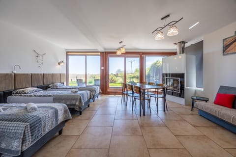 Communal lounge/ TV room, Bed, View (from property/room), Living room, Photo of the whole room, Seating area, Garden view, Landmark view, fireplace