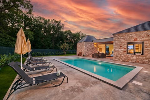 Patio, Day, Natural landscape, Pool view, Swimming pool, Sunset, sunbed