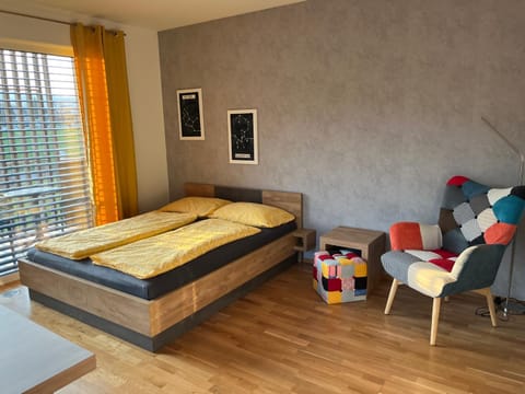 Bed, Living room, Seating area