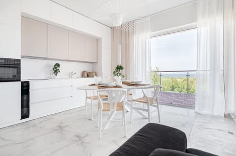 Coffee/tea facilities, Kitchen or kitchenette, Living room, furniture, microwave, stove, toaster