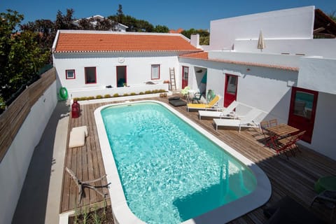 Property building, Patio, Pool view, Swimming pool, sunbed