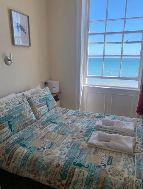 Bed, Sea view, towels