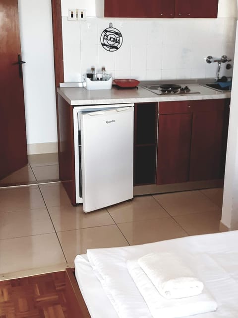 Kitchen or kitchenette, stove