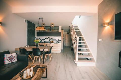 Kitchen or kitchenette, Living room, Seating area, Dining area