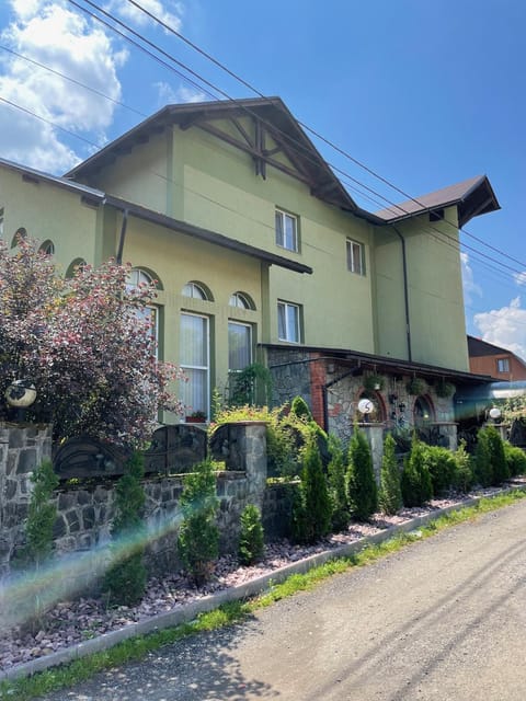 Property building, Facade/entrance, Day, Garden