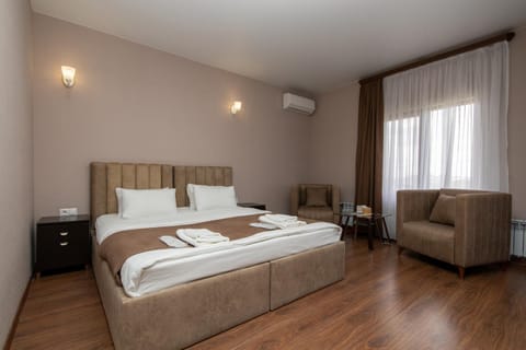 Bed, Photo of the whole room, Bedroom, towels, air conditioner