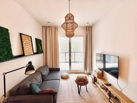 Communal lounge/ TV room, Spring, TV and multimedia, View (from property/room), Living room, Seating area, Area and facilities