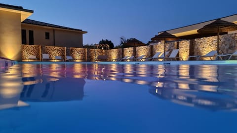 Property building, Night, Pool view, Swimming pool, sunbed