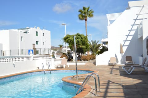 Property building, Pool view, Swimming pool, sunbed