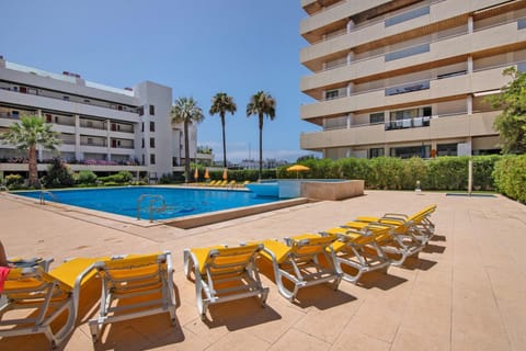 Property building, Living room, Swimming pool