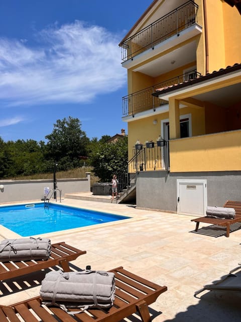 Property building, Patio, Day, View (from property/room), Balcony/Terrace, Pool view, Swimming pool, sunbed