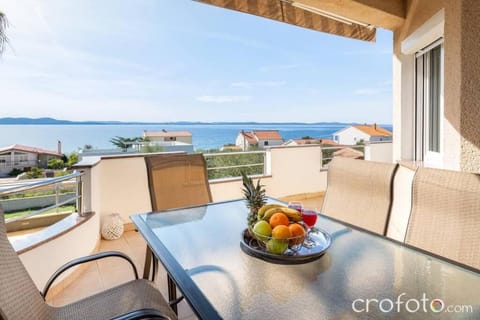 View (from property/room), Balcony/Terrace, Seating area, Sea view