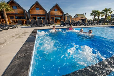 Pool view, Swimming pool, children, group of guests, sunbed