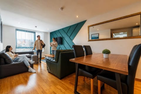 People, Living room, Seating area, group of guests