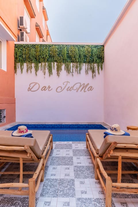 Property logo or sign, Swimming pool, sunbed