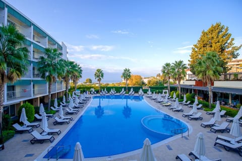Property building, Day, Natural landscape, Pool view, Swimming pool, sunbed