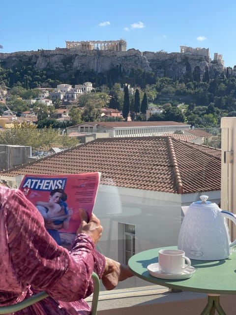 People, View (from property/room), City view, Landmark view