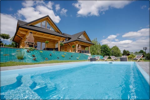 Property building, Pool view, Swimming pool, sunbed