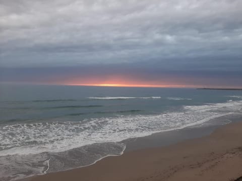 Property building, Natural landscape, Beach, Sea view, Sunset