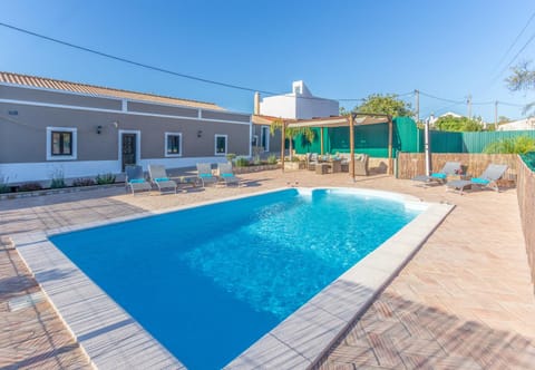 Swimming pool, sunbed