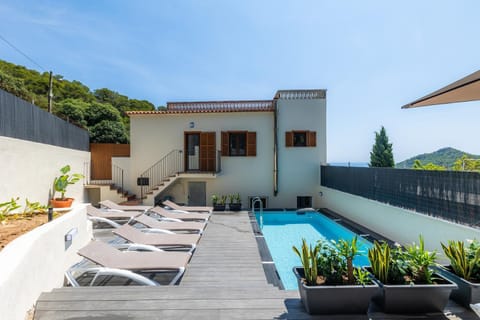 Property building, Living room, Swimming pool