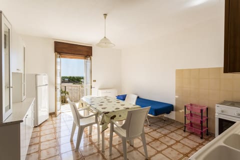 Kitchen or kitchenette, Living room, Seating area, Dining area, Sea view