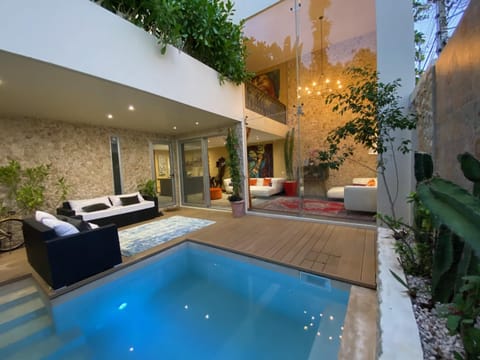 Property building, Patio, Communal lounge/ TV room, Pool view, Swimming pool