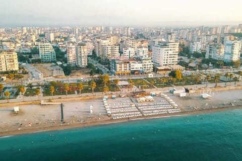 Property building, Nearby landmark, Day, Natural landscape, Bird's eye view, Beach, City view, Sea view, Location
