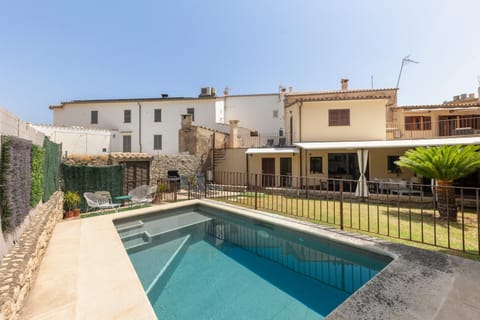 Property building, Living room, Swimming pool