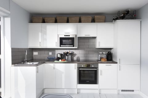 Kitchen or kitchenette, microwave, oven, pet friendly, stove, toaster