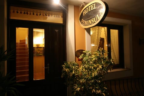 Facade/entrance, Night, Property logo or sign