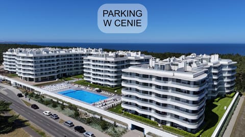 Property building, Day, Neighbourhood, Natural landscape, Bird's eye view, Text overlay, City view, Pool view, Sea view, Street view, Swimming pool, Location, Parking, sunbed