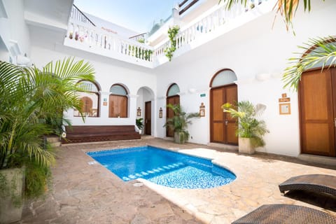 Property building, Patio, Swimming pool