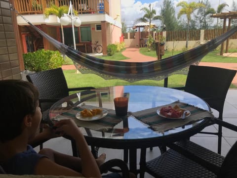 Property building, Patio, Day, People, View (from property/room), Balcony/Terrace, Living room, Food and drinks, Seating area, Dining area, Food, Continental breakfast, Lunch, Dinner, Drinks, group of guests