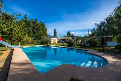 Property building, Living room, Swimming pool