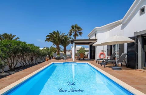 Property building, Pool view, Swimming pool, sunbed
