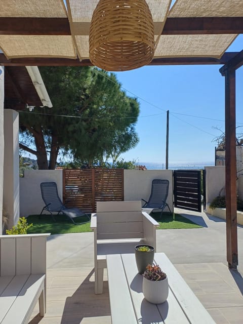 Patio, Living room, Seating area, Sea view