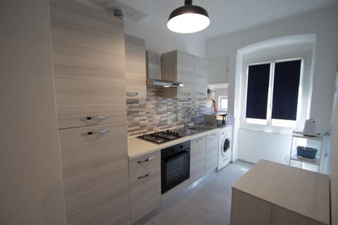 Kitchen or kitchenette, oven, stove