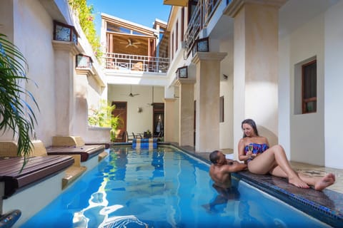Patio, Pool view, Swimming pool, group of guests