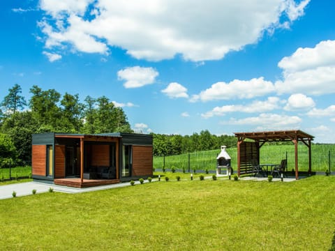 Property building, Off site, BBQ facilities, Garden, View (from property/room), Balcony/Terrace, Seating area, Guests, Landmark view, Location, group of guests, sunbed