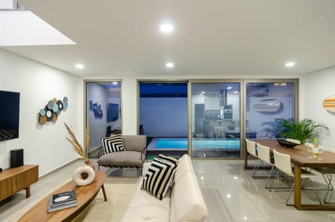 Living room, Dining area, Pool view