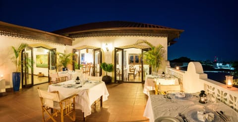 Restaurant/places to eat, Facade/entrance, Night, Balcony/Terrace, Seating area