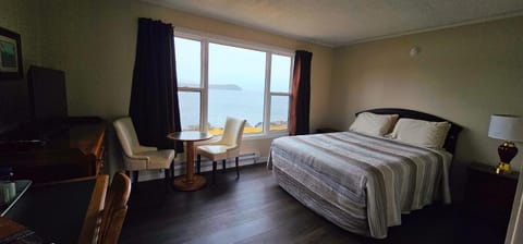 Bed, Natural landscape, Seating area, Bedroom, Mountain view